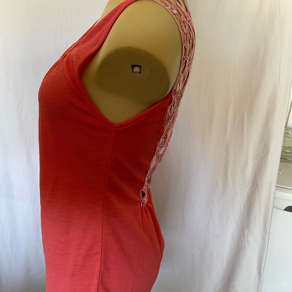 Filly Flair sleeve top. It has a very delicate detailed back in a coral color. - Picture 3 of 8